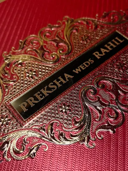 A detailed shot of the intricate gold metalwork on the nameplate, showcasing the quality and craftsmanship of the design.