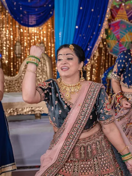 Another shot of the family ladies, capturing their expressive and energetic moves.