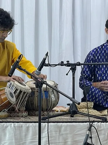 On stage with Sounak da in the US. The chemistry between the main artist and the accompanist is crucial for a successful performance.