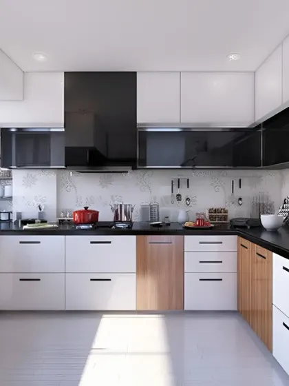 A U-shaped kitchen that maximizes counter space and storage. The two-tone design with black and white high-gloss cabinets, accented with wood, creates a modern and dynamic look.