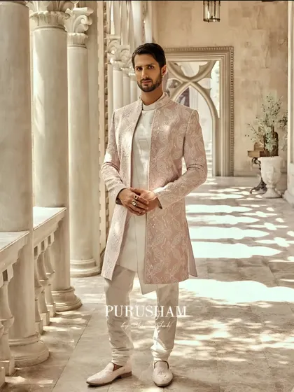 A full-length portrait that showcases the complete silhouette. The fit is paramount, designed to give the wearer a look of effortless grace and stature.