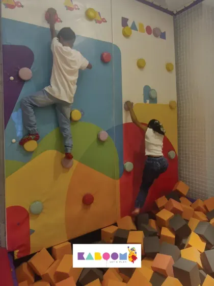 Teamwork makes the dream work! Our climbing wall has multiple paths, so friends can challenge themselves and climb together into the soft foam pit below.