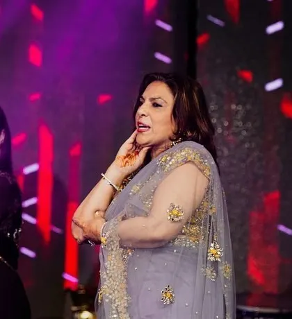 A beautiful moment between two ladies during their group performance. Their expressions and grace are a testament to their love for dance.