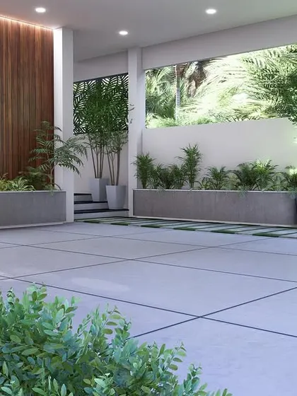 A wider perspective of the spacious and green parking area design, showing how a functional space can also be beautiful.