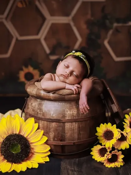 Another variation of our sunflower and barrel theme, with a honeycomb backdrop adding a 'sweet as honey' touch.