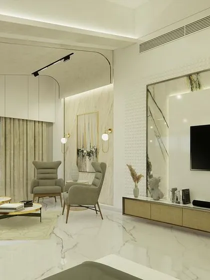A wider view of the bedroom, showing the TV unit and the seating area together.
