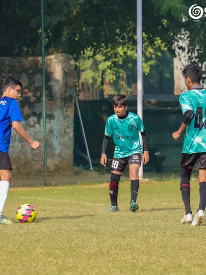 A moment of strategy as players position themselves during a break in play.