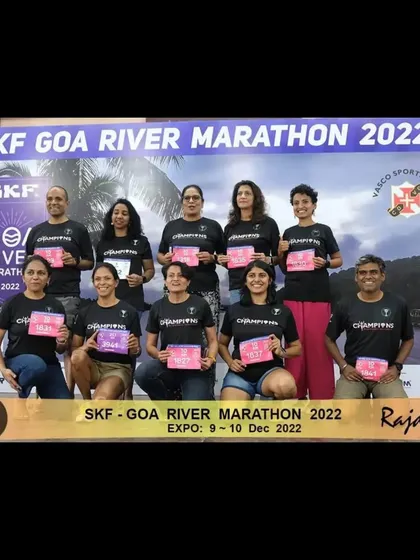 The team picking up their race bibs at the expo in Goa. The excitement builds before the big day.