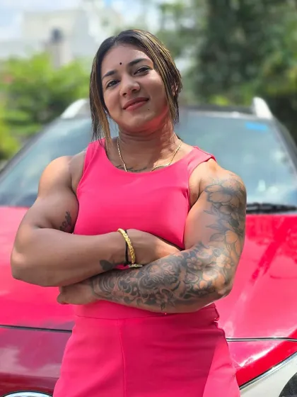 A smiling, confident look. My journey is about finding happiness and empowerment through strength.