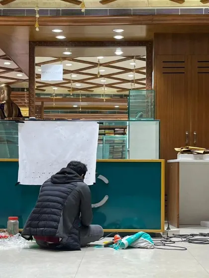 It's all in the details. Our team carefully works on the finishing touches for the jewelry store's display counter, ensuring every element aligns with the brand's luxury aesthetic.