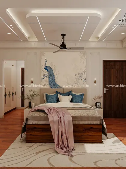 This spacious master bedroom features a stunning peacock mural as the headboard's backdrop. The design is both artistic and calming, with a clean layout and wooden flooring.