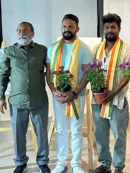 Being felicitated alongside fellow artists at the event.