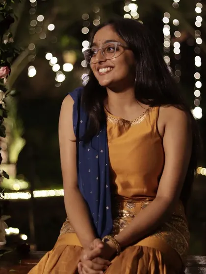 A candid moment at a wedding reception. The beautiful decor with fairy lights and flowers created a magical setting for our performance.