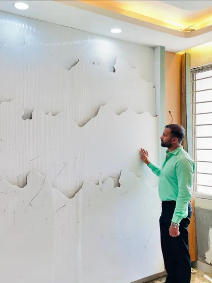 Coming soon! This is a sneak peek of a unique wall texture we are creating. The mountain-like design is being crafted by hand for a truly custom finish.