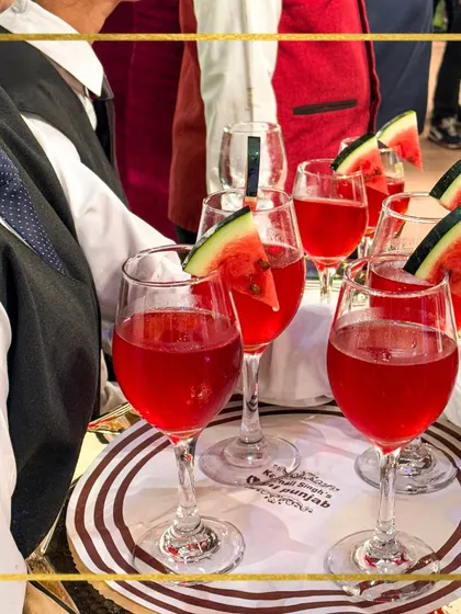 Our coolers counter is designed to quench thirst with elegance. These vibrant watermelon coolers, served in wine glasses, are a stylish and refreshing choice for any celebration.