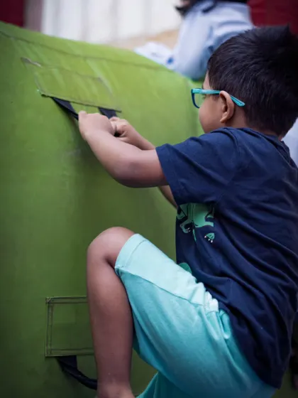 A child exploring and climbing during an event. I am always looking for these action shots that show the energy and curiosity of the little guests.