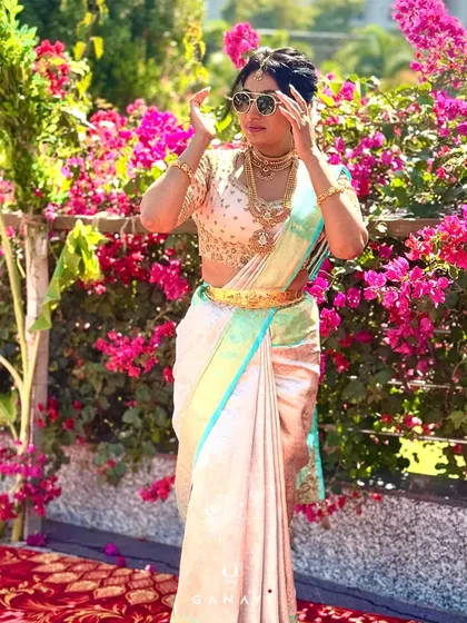 My client looking gorgeous in our custom-crafted ensemble. The beautiful play of colors and delicate embroidery on the blouse create a classy and modern traditional look.