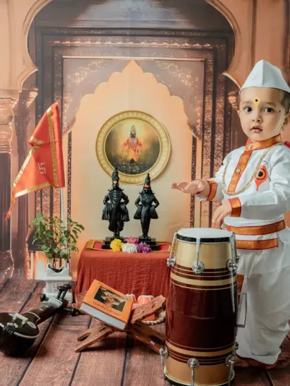 A wide shot of the entire Varkari setup, showing all the elements like the veena, drum, and altar that come together for this unique theme.