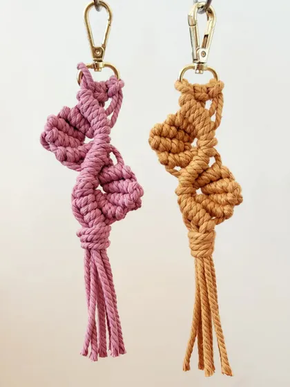 This spiral vine pattern is a unique and elegant keychain design. I make these in earthy tones like dusty pink and mustard, perfect for a subtle, handmade accessory.