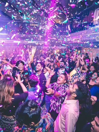 A moment of pure celebration as confetti rains down on a joyful crowd. This is the vibe I strive for at every party, from private gatherings to large club nights.