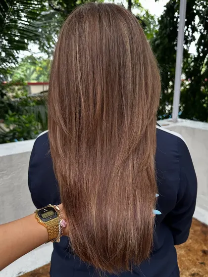 A beautiful, straight look at an ash blonde color service. The cool tones are perfect for neutralizing any brassiness.