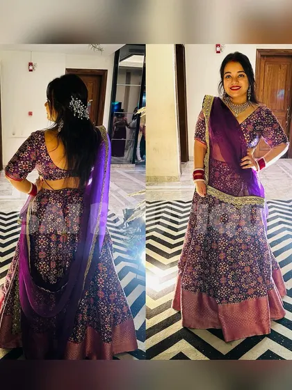 A beautiful shot of a client in a purple patola print lehenga. The traditional print combined with a modern blouse design makes it a unique choice for a wedding event.