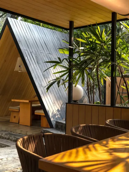 The Scandinavian-inspired A-frame pods at Tubu, a garden restaurant in Chandigarh. These structures offer private dining experiences, nestled within the landscape like habitable sculptures.