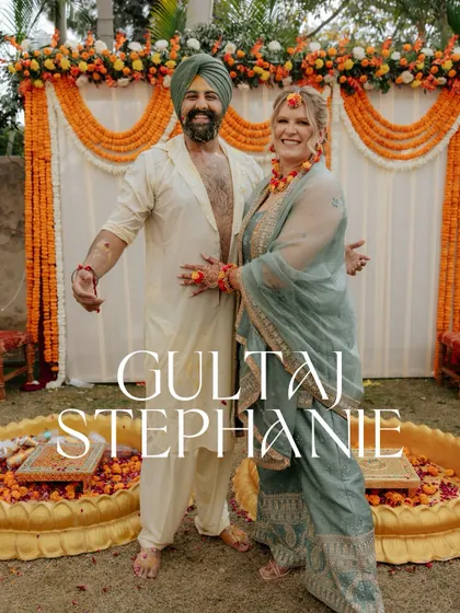 A happy portrait of the couple after their Haldi, covered in turmeric and full of smiles.