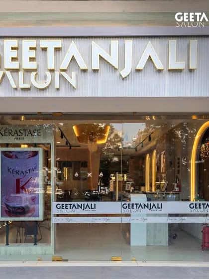 The stunning glass facade of our new salon in Maple Tree, Ahmedabad. We invite you to step into a world of ultimate beauty and pampering.