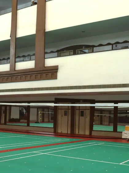 A side view of the indoor hall, showing the architecture and layout of the facility. It's a space built for serious athletic development.