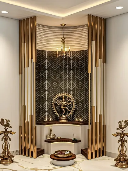 This pooja room design is a statement in modern divinity. I used dramatic gold-finished vertical fins, a patterned backdrop, and focused lighting to create a sacred space that is both grand and deeply spiritual.