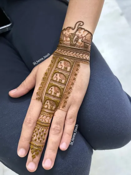 A charming Rakshabandhan design featuring a trail of elephants. This is a unique and playful take on festive mehndi.