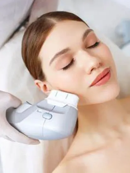This image shows a High-Intensity Focused Ultrasound (HIFU) treatment in progress. It is a powerful, non-surgical method I use to lift and tighten sagging skin by stimulating your body's own collagen production from deep within.