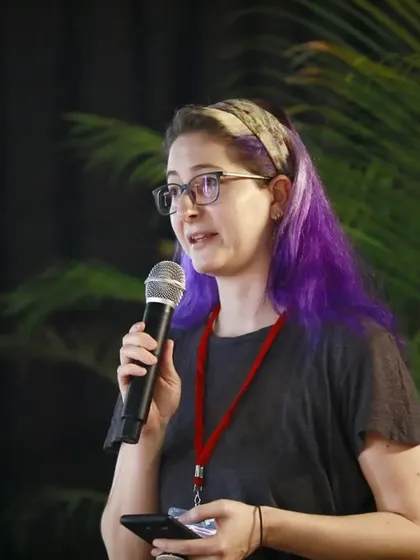 An international artist speaks at our conference on puppet traditions. We believe in creating a global dialogue, and our festivals feature puppeteers and scholars from around the world, like this speaker from Austria.