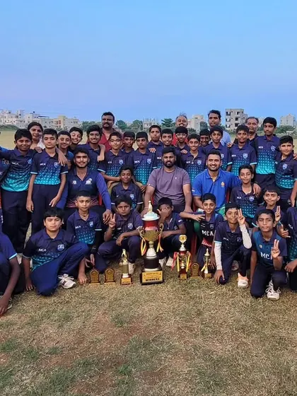 The entire touring party, including players and coaches, celebrating the Dasara Cup victory in Hubli.