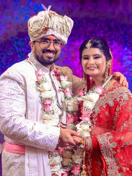 A close-up of the happy couple, their smiles radiating joy.