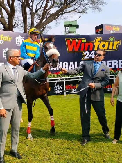 Moon's Blessing, with jockey F. Norton, after winning The Srikantadatta Narasimharaja Wadiyar Memorial Trophy.