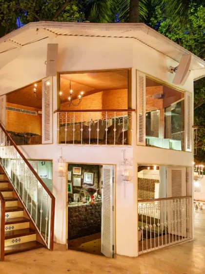 Our two-story private dining building, offering an exclusive experience for small groups. The architecture adds to the unique, villa-like feel of the restaurant.