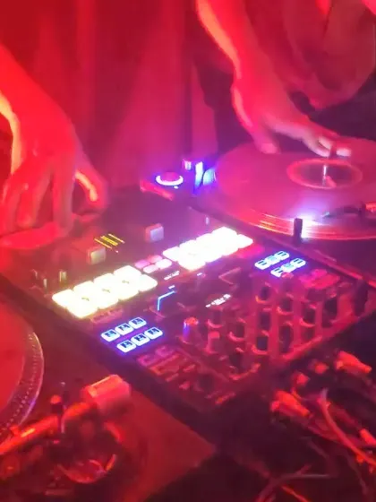 A close up of my hands on the turntables during a live set. This is where the magic happens. I treat turntablism as an art, using scratching and mixing on vinyl to build energy that you can't get from just pressing play.