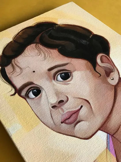 A detail shot of the acrylic portrait of Varnika. The canvas texture adds a beautiful, classic feel to the finished painting, enhancing the soft, painterly style.