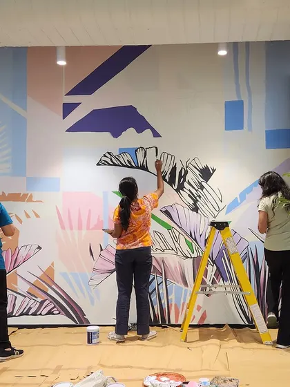 Our team of artists working together on the large-scale JLL office mural. We can deploy teams to complete even the biggest projects efficiently and to the highest standard.