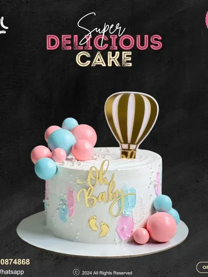 "Oh Baby!" This lovely cake is perfect for a baby shower. It features soft pastel colors, a golden hot air balloon topper, and cute baby feet details, creating an elegant and sweet design.