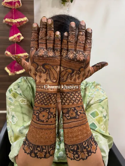 A full view of this beautiful peacock and lotus mehendi.
