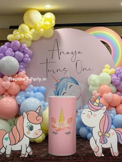My unicorn themed parties are filled with magic. These images show various designs featuring balloon mosaic numbers, themed plinths, and beautiful pastel color palettes.