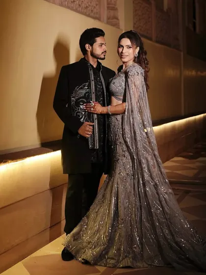 Nothing stuns quite like glass skin paired with glam eyes. This client was the epitome of elegance at her soirée, looking radiant and refined in a shimmering silver lehenga with a flawless makeup finish.