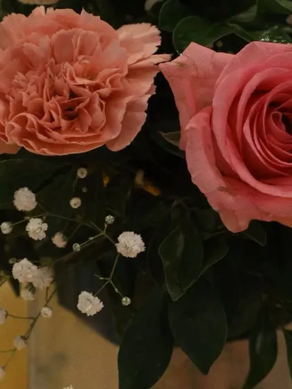 The rich color and texture of pink roses and carnations. We carefully select every flower to ensure our arrangements are fresh, vibrant, and beautiful from every angle.