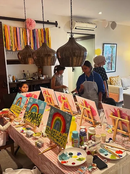 We love bringing back our Kids Only Workshops. This one was a rainbow-themed party at a private home, where little artists created beautiful, colorful landscapes.