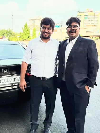 With a senior colleague. I value the mentorship and camaraderie that defines our profession.