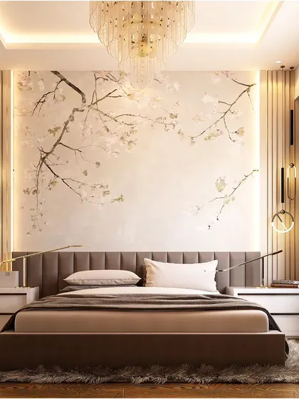 This bedroom achieves a serene, minimalist aesthetic with a Japanese-inspired cherry blossom mural. The simple upholstered headboard and modern wall sconces create a balanced and peaceful sleeping space.