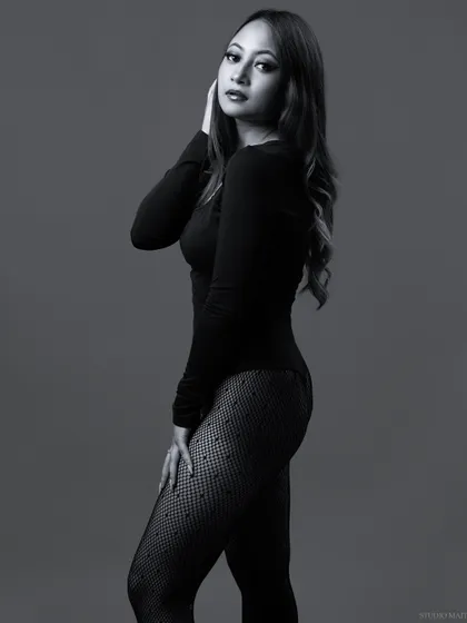 A simple and elegant side-profile portrait in black and white.